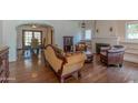 Cozy living room showcasing hardwood floors, classic furniture, and traditional fireplace at 1134 W Portland St, Phoenix, AZ 85007