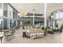 Modern lounge area featuring comfortable seating, stylish decor, and ample natural light at 11952 W Calle De Pompas --, Peoria, AZ 85383