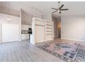 Open-concept living space with tile flooring and a partial room divider at 3055 N Red Mtn # 122, Mesa, AZ 85207