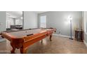 Spacious game room featuring a billiard table, ideal for entertaining guests at 4741 N 85Th Ave, Phoenix, AZ 85037