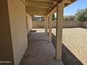 View of covered back patio overlooking large backyard area, great for entertaining or relaxing at 5608 W Carol Ave, Glendale, AZ 85302