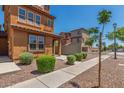 A well-maintained home with desert landscaping and a sidewalk leading to the entrance at 7732 W Bonitos Dr, Phoenix, AZ 85035