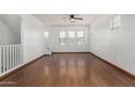 Bright living room with hardwood floors, and neutral walls at 7732 W Bonitos Dr, Phoenix, AZ 85035
