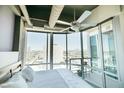 Well lit bedroom with a beautiful skyline view and a small balcony at 1 E Lexington Ave # 1306, Phoenix, AZ 85012
