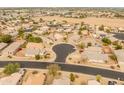 Residential area showcasing well-maintained homes and a calm street at 10226 N 93Rd Dr, Peoria, AZ 85345