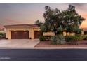 Charming single-story home with a tile roof, mature landscaping, and a spacious three-car garage at 13219 W Santa Ynez Dr, Sun City West, AZ 85375