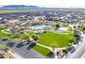 Aerial view of community park, pool, splash pad, picnic, and recreation areas at 2567 E San Isido Trl, Casa Grande, AZ 85194