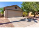 Spacious two-car garage and driveway offer ample parking for residents and guests alike at 3018 W Country Club Ter, Phoenix, AZ 85027
