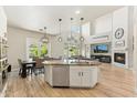 Bright and airy kitchen with stainless steel appliances, granite countertops, and an island at 3817 E Patrick Ln, Phoenix, AZ 85050