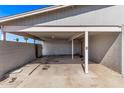 An open carport offers shaded parking with a concrete floor at 5902 W Orange Dr, Glendale, AZ 85301