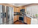Modern kitchen with stainless steel appliances and ample counter space at 67 W Sarah Ln, Tempe, AZ 85284