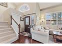 Comfortable living room with stylish decor, plush seating, and natural light at 67 W Sarah Ln, Tempe, AZ 85284