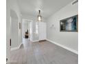 Bright foyer with tile flooring, arched doorways, and an elegant light fixture offers a welcoming ambiance at 8180 E Shea Blvd # 1019, Scottsdale, AZ 85260