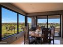 Dining room featuring large windows with breathtaking views and seating for six at 1040 E Osborn Rd # 501, Phoenix, AZ 85014
