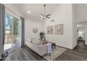 Bright living room with sliding glass door leads to outdoor space with vaulted ceiling at 1633 E Lakeside Dr # 127, Gilbert, AZ 85234