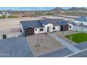 Aerial view of home displaying landscaping, block wall fence, and desert surroundings at 2005 W Lincoln Ct, Queen Creek, AZ 85144