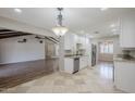 Bright kitchen area features sleek appliances and an open layout into the living room at 2178 E Golf Ave, Tempe, AZ 85282