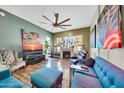 Inviting living room features a fireplace, plush furniture, and ample natural light at 2302 N Central Ave # 311, Phoenix, AZ 85004