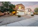 Attractive home with a well-lit entrance and landscaped front yard at 12026 W Salter Dr, Sun City, AZ 85373
