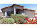 Home exterior shows a manicured front yard with desert landscaping and a covered entry at 1501 E Sunland Ave, Phoenix, AZ 85040