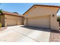 This home has three garages, a two-car and a single-car garage with plenty of driveway space at 17937 W Westpark Blvd, Surprise, AZ 85388