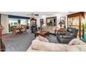 Elegant living room featuring plush seating, decorative mirror, and stylish furnishings at 3351 N 6Th Ave, Phoenix, AZ 85013