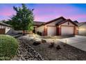 Charming single-story home featuring a well-manicured front yard with mature trees and a spacious three-car garage at 4821 E Kirkland Rd, Phoenix, AZ 85054