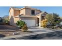 Southwest style home with a tile roof, two car garage and desert landscaping, located in Scottsdale, Arizona at 9548 E Kiva Ln, Gold Canyon, AZ 85118