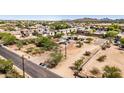 Expansive lot featuring mature trees with structures, nestled in a neighborhood setting and mountain views at 1851 E Campo Bello Dr, Phoenix, AZ 85022