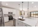 Bright kitchen featuring white cabinets, stainless steel appliances, and eat in kitchen at 18773 E Panchito Dr, Gold Canyon, AZ 85118