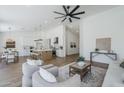 Open-concept living space with seamless flow between the kitchen and living areas at 7144 E Lakeview Ave, Mesa, AZ 85209