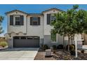 Charming two-story home with stucco detail and a two car garage at 905 S Canal Dr # 17, Chandler, AZ 85225