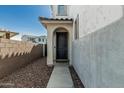 Front door featuring a covered porch and a gravel walkway at 905 S Canal Dr # 17, Chandler, AZ 85225