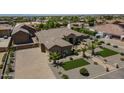 Stunning home featuring desert landscaping, an attached garage, and a stone facade at 10033 W Jj Ranch Rd, Peoria, AZ 85383