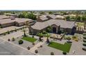 Stunning home featuring desert landscaping, palm trees and a stone facade at 10033 W Jj Ranch Rd, Peoria, AZ 85383
