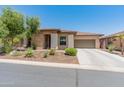 Beautiful single-story home with desert landscaping and a light tan exterior at 13186 W Via Dona Rd, Peoria, AZ 85383