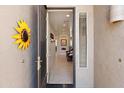 Inviting entryway featuring a view into the home with tile floors and neutral color palette at 1819 W Deer Creek Rd, Phoenix, AZ 85045