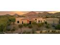 Gorgeous desert home with lush xeriscaping, and tile roof in a serene setting at 24200 N Alma School Rd # 7, Scottsdale, AZ 85255