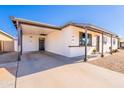 Exterior view of home highlighting the convenient covered parking and neat landscaping at 1001 W 19Th St, Tempe, AZ 85281