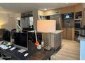 Open-concept kitchen with granite countertops and stainless steel appliances at 11028 W Crimson Ln, Avondale, AZ 85392