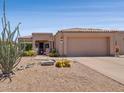 Charming exterior of a single-story home with desert landscaping and a tile roof at 17214 E Alta Loma --, Fountain Hills, AZ 85268