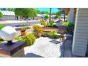 Inviting front porch area with comfortable seating and decorative plants at 2064 S Farnsworth Dr # 38, Mesa, AZ 85209