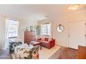 Bright living room with plush seating, large windows, and stylish decor at 2990 E Franklin Ave, Gilbert, AZ 85295