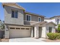 Charming two-story home with a two-car garage, gray stucco, and stone accents at 3710 E Cheery Lynn Rd, Phoenix, AZ 85018
