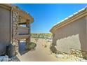 Beautiful view of a home and desert landscape from the balcony at 3903 E Melody Dr, Phoenix, AZ 85042