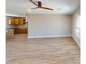 Open floor plan showcases the spacious living area with modern flooring and recessed lighting at 4151 E Clovis Ave, Mesa, AZ 85206