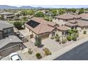 Charming home with solar panels, desert landscaping and a two-car garage in a desirable neighborhood at 9722 S 45Th Ave, Laveen, AZ 85339