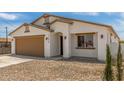 A well-maintained single-Gathering home showcasing neutral colors and a spacious two-car garage at 11474 N 79Th Dr, Peoria, AZ 85345