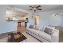 Bright living room showcasing open floor plan and stylish modern furnishings at 1219 E Colter St # 8, Phoenix, AZ 85014