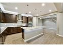 Spacious kitchen featuring granite countertops, modern appliances, and a large center island perfect for entertaining at 18562 N 94Th St, Scottsdale, AZ 85255
